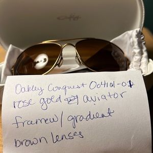 Oakley polarized 004101-01 rose gold frames.  One very small scratch right.
